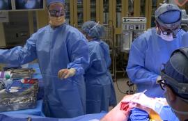 Surgical Tech handing surgeon valvulotome