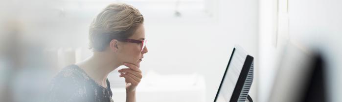 Woman looking at computer